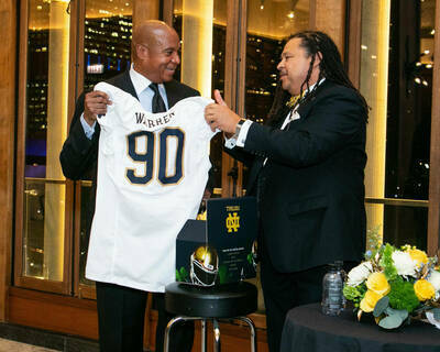Kevin Warren (left) and ND Law Dean G. Marcus Cole