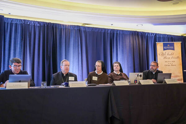 Fr. Pujol, Bishop McClory, two sisters in habits, and Fr. Kimes at the Notre Dame Religious Liberty Summit.